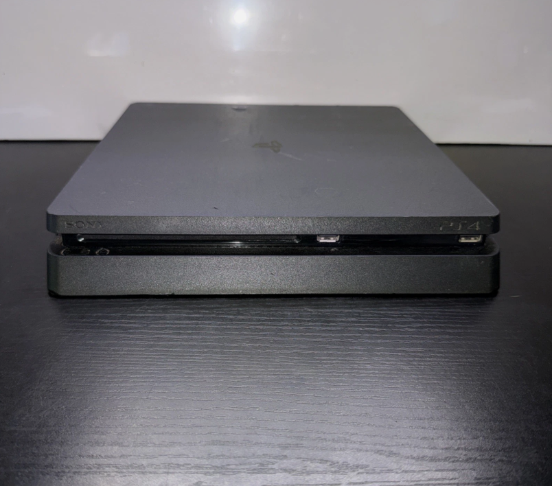 Sony PlayStation 4 Console  slim (with 4 games)